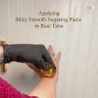 Applying Sugaring Paste in Arm